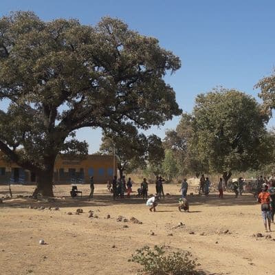 Students playing sports in the courtyard of Koubri College in Burkina Faso