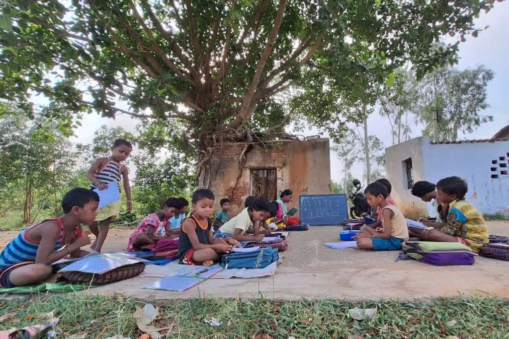 Children in an outdoor classroom in India