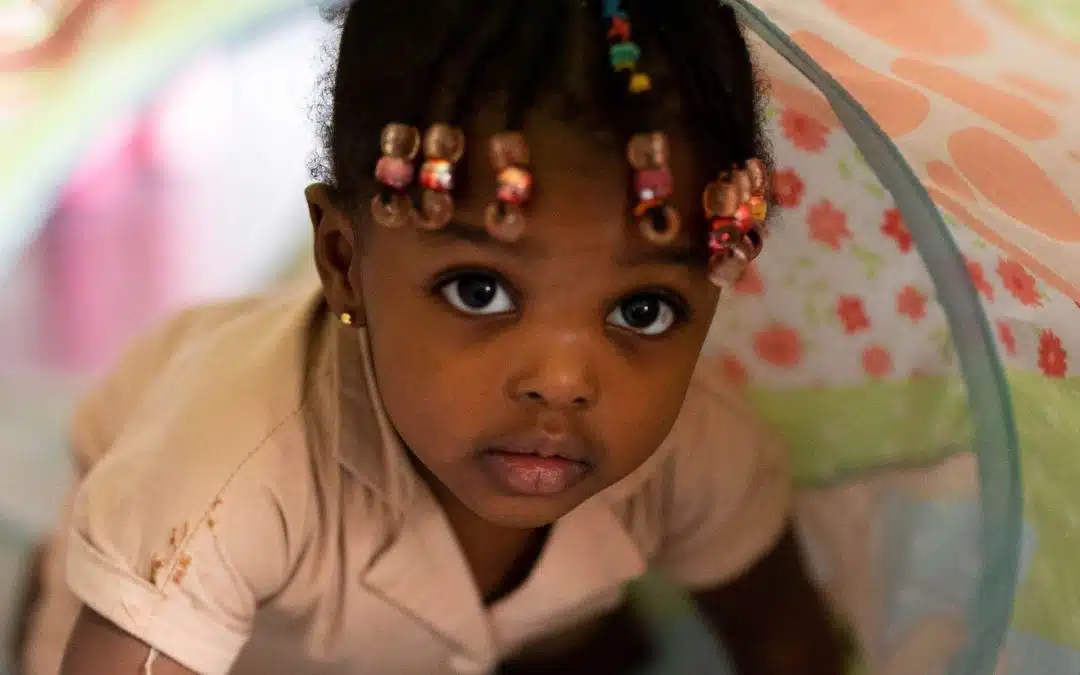 A baby plays during an early-learning workshop.