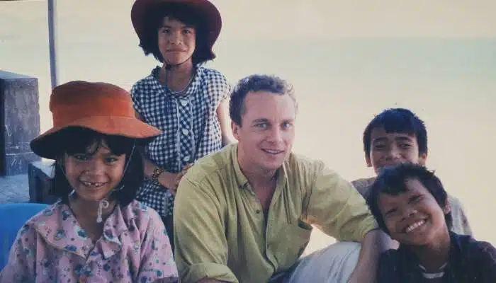 Robert Holland with street children in Vietnam