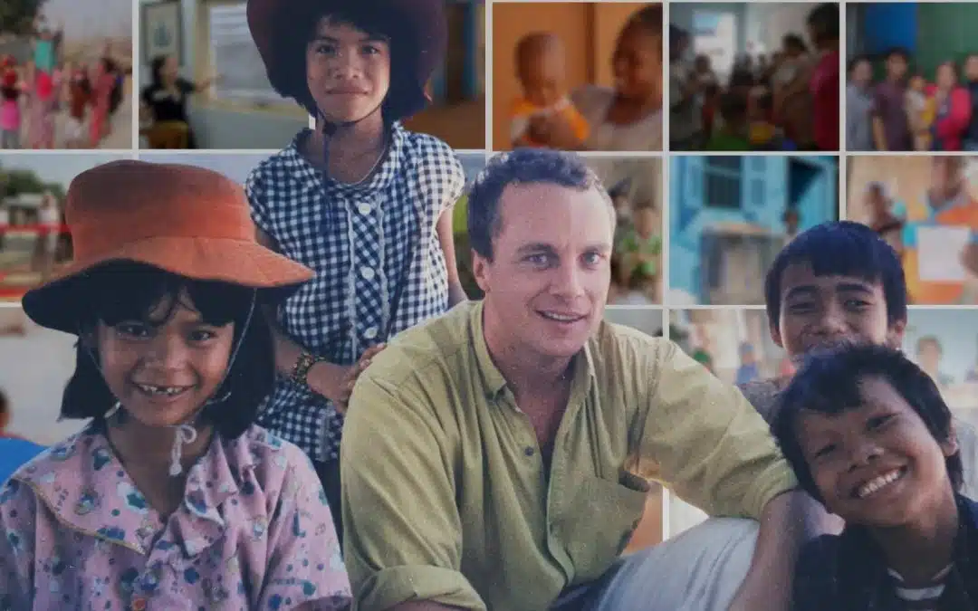 Portrait of Robert Holland with children in Vietnam