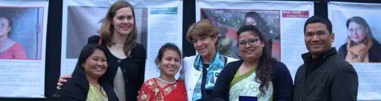 Perrine Bacchetta Savoie in front of the Radiant Women exhibition in Nepal