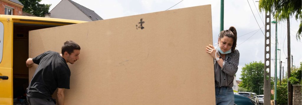 Sophie unloads a truck during a workshop