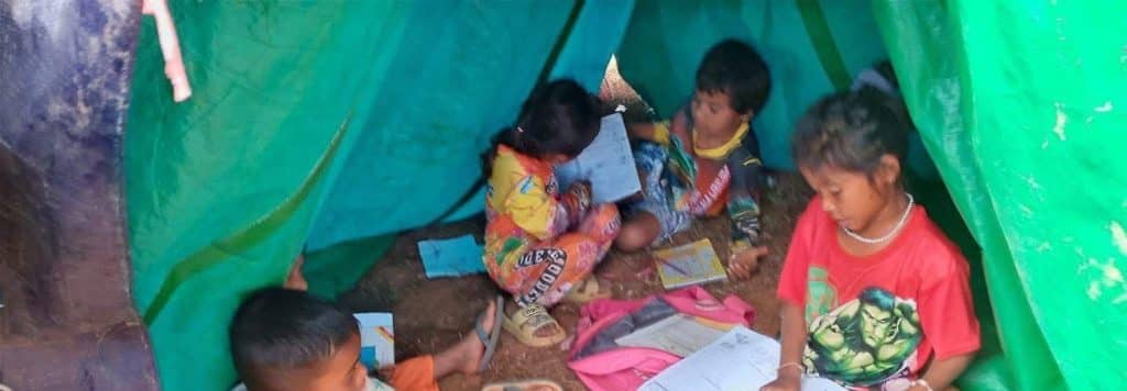 Cambodian children displaced to a camp near Siem Reap