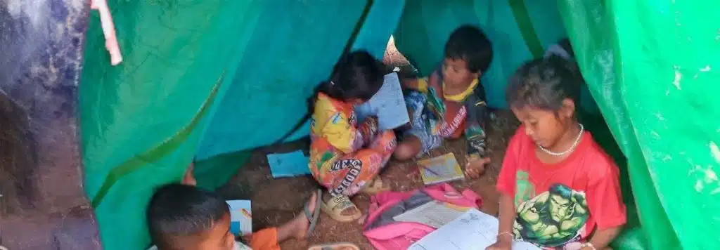 Cambodian children displaced to a camp near Siem Reap