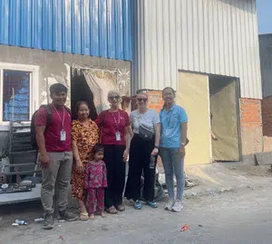 The Cambodia team in front of the houses in the Hali project